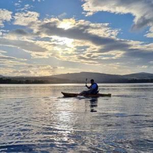 Kayaking on lake in Ireland
